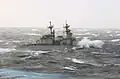 Heavy seas prohibit underway replenishment. USS Paul F. Foster gives up the attempt to come alongside, 2002.