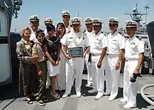 Photograph of Filipino American U.S. Navy  personnel aboard the USS Comstock (LSD-45) at Naval Base San Diego.