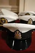 Peaked cap with badge of a senior appointment chief petty officer 1st class of the RCN.