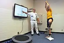 Image 146A video game is used during a physical therapy session at the Naval Health Clinic in Charleston. (from 2010s in video games)