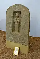 Unfinished granite stela with statue of Osiris found in the chapel of the Pyramid 3 of Senkamanisken at Nuri