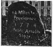 Peleg Arnold's 1774 milestone on old Great Road across from the Quaker Meeting House