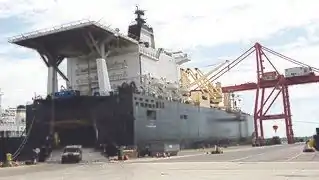 USNS PFC Dewayne T. Williams (T-AK-3009) unloading cargo