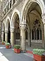 The architectural style is a mix of Venetian Gothic and Neoclassical