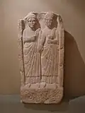 Gallo-Roman tombstone showing a couple holding hands. Found in Horbourg