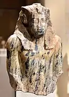 Upper part of a statue of Senusret I, from Egypt, Middle Kingdom, 12th Dynasty. C. 1950 BCE. Neues Museum, Germany