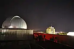 Observatory built in 2009 on top of the SER building as seen at night.