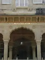 A closer view of gate, one can see name plate - Vijaya Vilas - on top of entrance