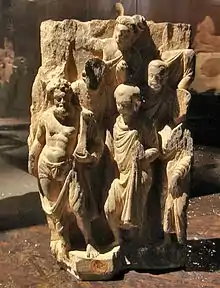 Herakles/Vajrapāni with a group of Buddhist monks. Gandhara