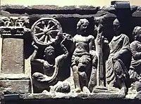 Herakles/Vajrapāni with the Buddha, holding the Heraklean club.