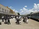 Passengers debark a train