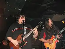 Van Conner (left) performing with Patrick Conner (right) in the band  VALIS