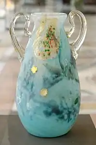 Vase with lilies and daises, multi-layered blown crystal with inclusions of glass and gold dust, cabochons and handles added on and fused (1896) (Petit Palais)