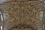 Details of the Gothic lines and iconographic sculpting over the altar of the Capilla Mayor