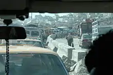 Vehicles queuing at Kalandia checkpoint in Palestine, August 2004