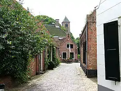 Historical street with church tower