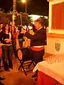 Venenciador serving sherry in Feria.