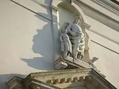 Statues of Tobias and Raffaele over entrance.