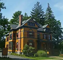 Front view of house, partially in shadow