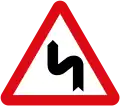 Double bend, first to the left