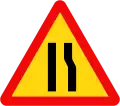 203c: Road narrows ahead on the right side