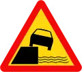 215b: Embankment along the right side of the road