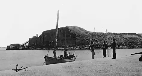 View of Fort Sumter from the sandbar, 1865.