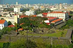 The PLM campus in Intramuros and its vicinity as seen from the Manila Hotel.