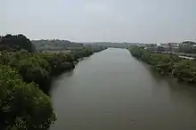 A view of St. Thomas Church and the Mapusa River tributary of the Mandovi River