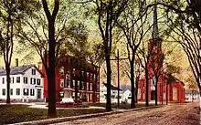 Brown Square in 1913, viewed from before the City Hall. The statue is that of "Garrison the Liberator". The houses and church still stand but the street has been paved and more modern buildings inserted.