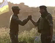 Greeting a Ukrainian soldier at the checkpoint "Jolly Mountain" near Luhansk, 18 August 2014