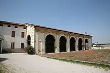 Barchessa of the Villa Thiene in Cicogna, the only remnant of a Palladian project