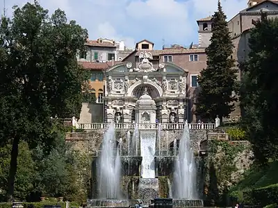 Fountain and waterfall in a park.