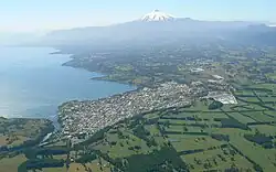 Route 199-CH runs across the city of Villarrica and goes then eastward (up in the photo) along Villarrica Lake