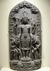 11th-century Vishnu sculpture the goddesses Lakshmi and Sarasvati. The edges show reliefs of Vishnu avatars Varaha, Narasimha, Balarama, Rama, and others. Also shown is Brahma. (Brooklyn Museum)