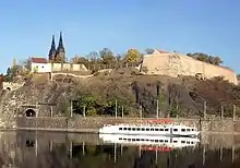 Vyšehrad fortress contains Basilica of St Peter and St Paul, the Vyšehrad Cemetery and the oldest Rotunda of St. Martin.