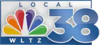 A silver box with a blue border and a blue box below it. Sitting above all the elements and to the lower right is a blue 38 in white trim. The NBC network logo is to the left. On top is the word "Local". In the blue box and below the NBC logo are the call letters "WLTZ".