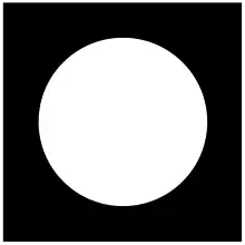 A white circle on a black square background