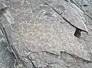 A collection of petroglyphs on the right hand side of the lower reaches of the Wadi Eliji, below the village of Wadi Eliji.