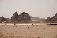 Wadi Rum rock formations along with Bedouin camps