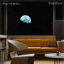 An interior of a structure located in space, with the Earth being viewable through its window. At the top corners of the image are Walk the Moon's name and the title "Kamikaze".