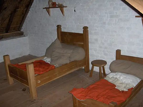 Medieval-reconstruction rope beds (circa 1465); note loops of rope protruding from side boards