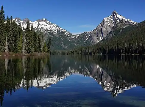 Bears Breast Mountain (right) from southeast at Waptus Lake. Little Big Chief Mountain (left), Dutch Miller Gap centered.