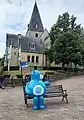 Warm William with the church of Zutendaal in the background.