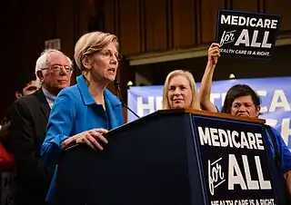 Image 10Elizabeth Warren and Bernie Sanders campaigning for extended US medicare coverage in 2017.  (from Health politics)