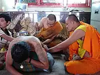 Hlwong Pi Nan tattooing at Wat Bang Phra Temple