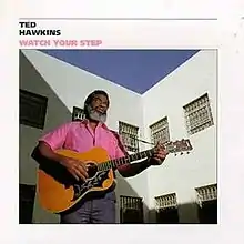 White album cover featuring words "Ted Hawkins" and "Watch Your Step" with an image of a man in a pink shirt playing guitar in front of a white building.