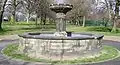 The octagonal fountain is dated 1897