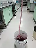 Water is coloured with potassium permanganate for easy visualization.