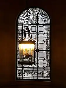 The stained glass window in the staircase.
